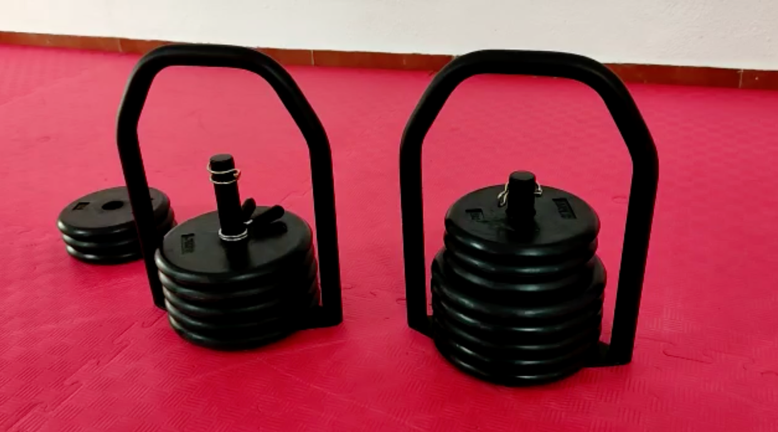 Regulabell adjustable kettlebells at different weight configurations